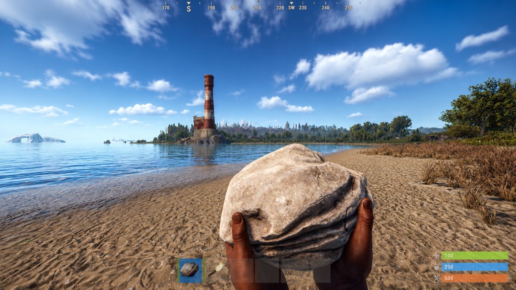 Beach spawn with rock and torch in the hotbar